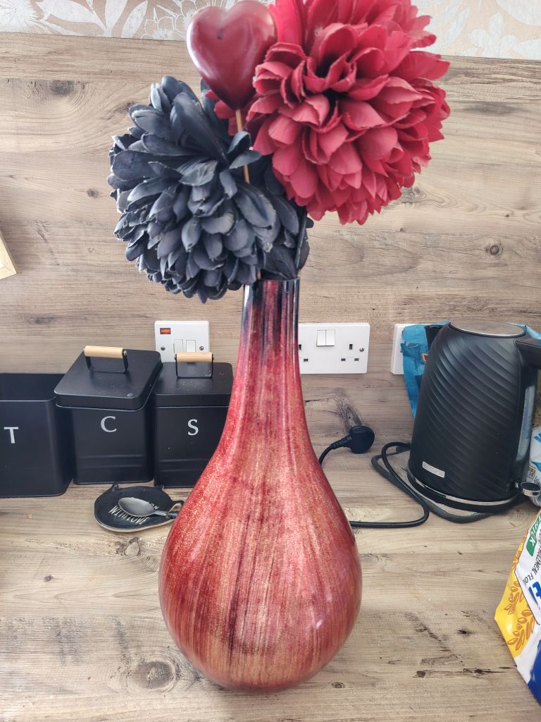 Next vase and flowers