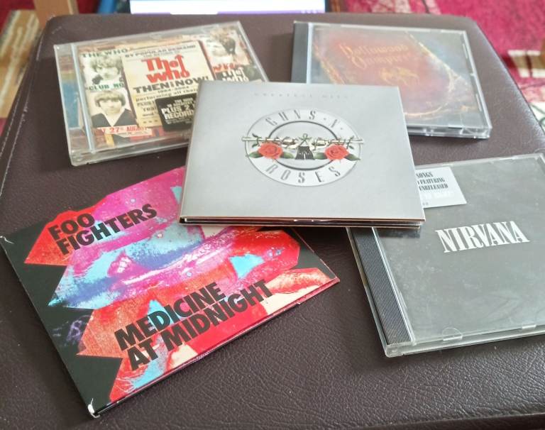 Collection of x5 Rock CDs