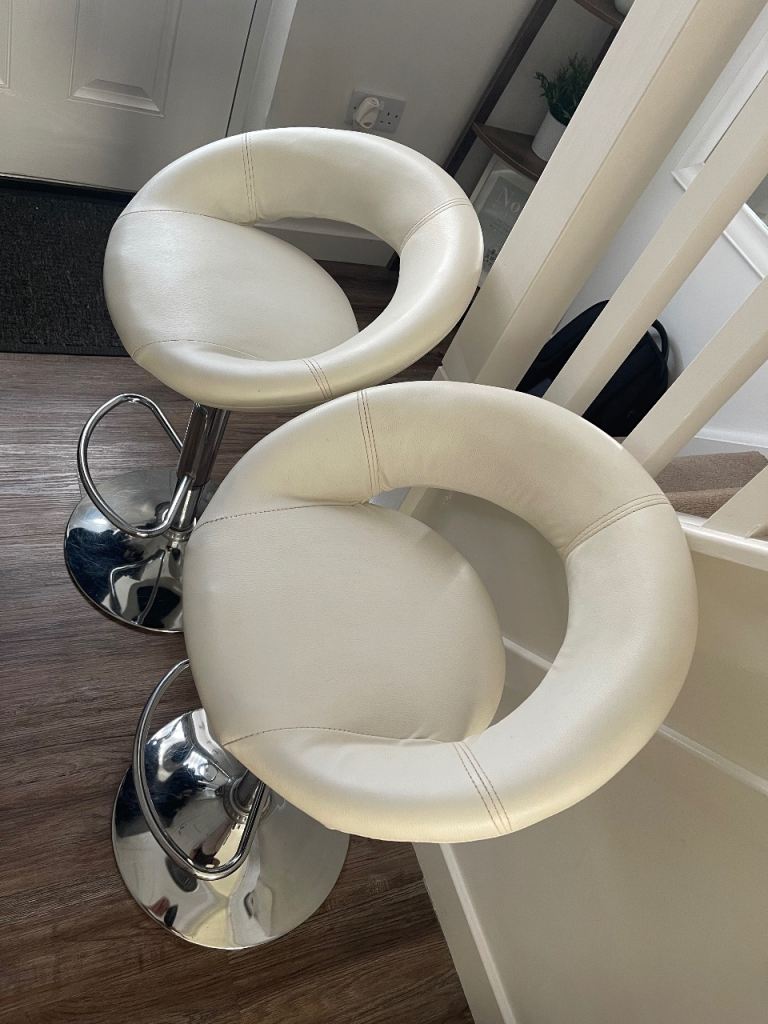 White faux leather bar stools