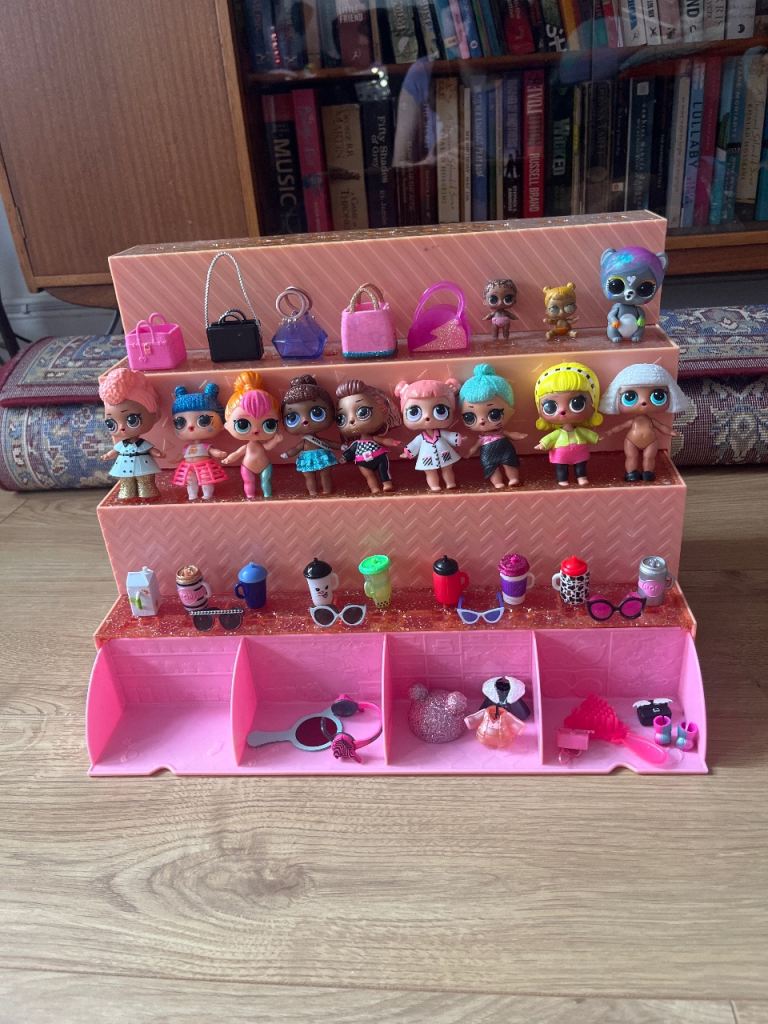 LOL show stand plus lots of dolls, pets and accessories 