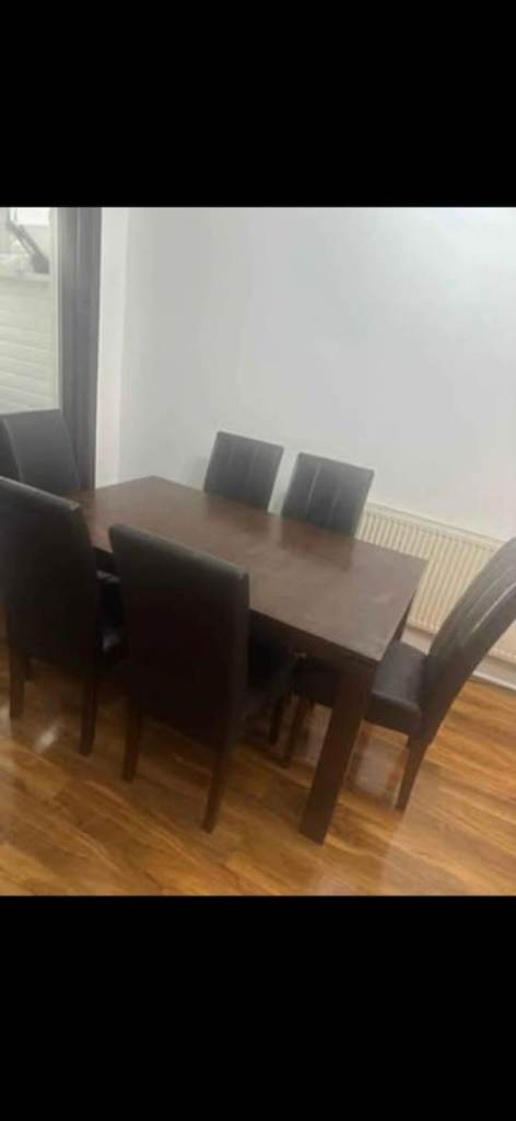 Wooden Dining Table with Six Chairs – Good Condition