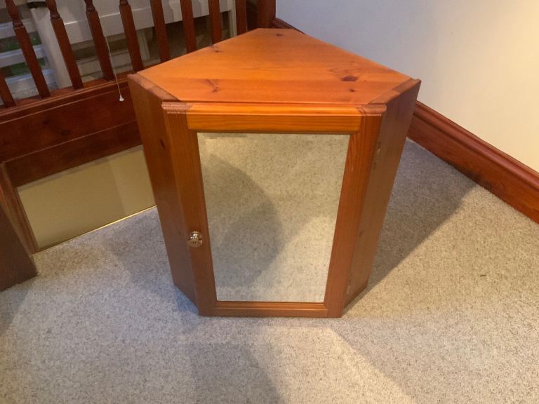 Teak corner cabinet 