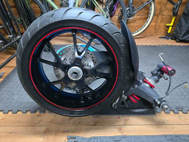 image for TRIUMPH SPEED TRIPLE 1050 2013 SINGLE SIDED SWINGARM COMPLETE WITH WHEEL AND REAR SHOCK