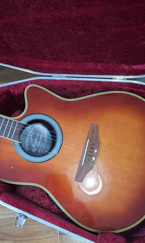 Electric/acoustic guitar, model AE138. Approx 20 years old. with hard case