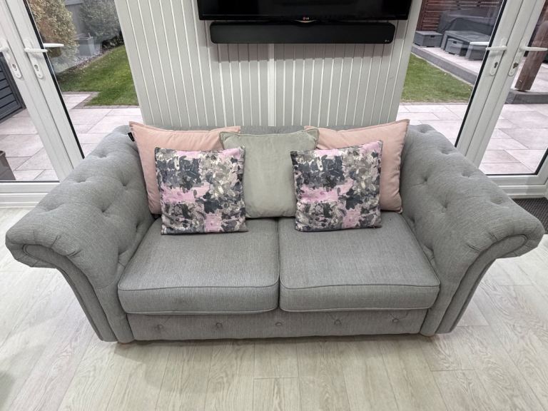Grey Two-Seater Sofa – Good Condition