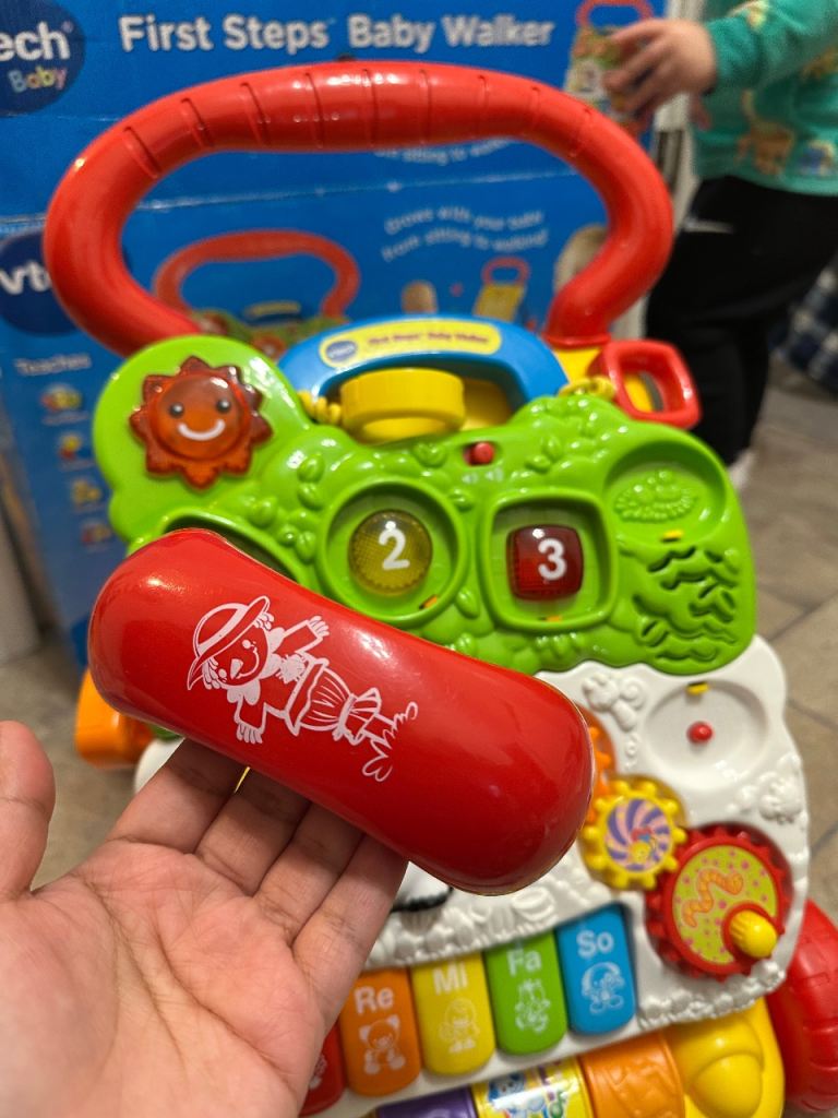 VTech Baby First Steps Walker, a 2-in-1 activity center and push-along walker