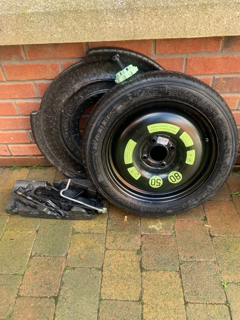 Space saver spare wheel, clamp and jack set. 