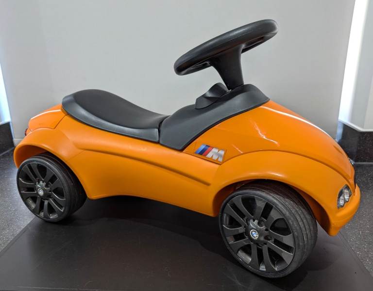 BMW BABY KIDS RACER RIDE-ON PUSH-ALONG TOY CAR ORANGE BLACK STEERING WHEEL HORN