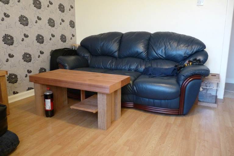 Dark blue leather sofa. 3 seater