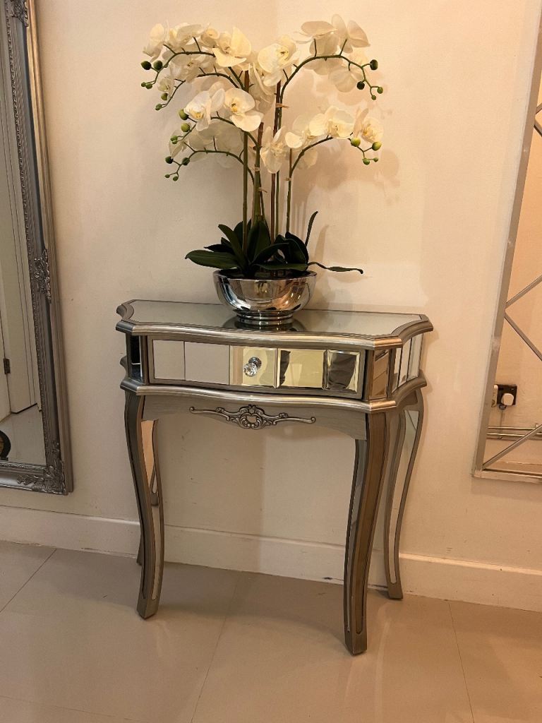 Half-moon mirrored console table
