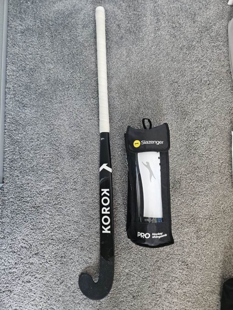 Hockey stick and shin pads