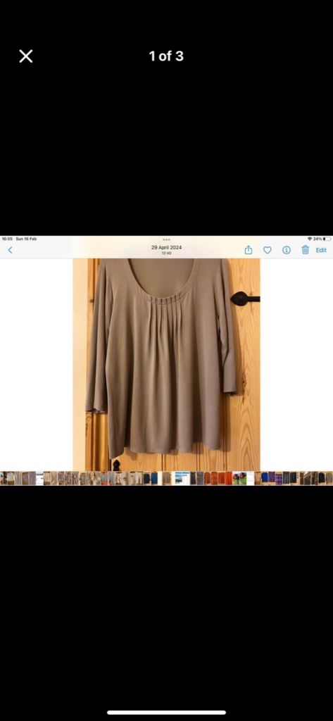 image for Unusual Ladies 3/4 length sleeve top. By Marks and Spencer.