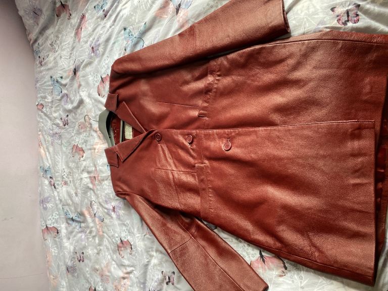 New ladies leather coat, never been worn