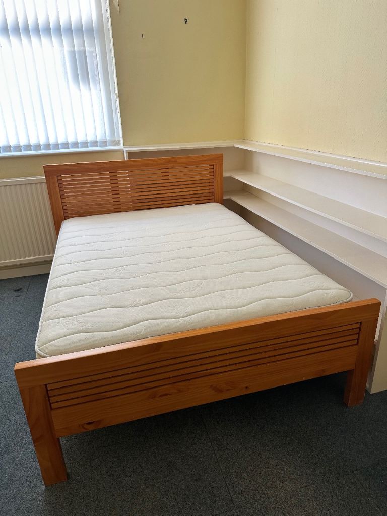 Solid wood double bed with mattress (very good condition)
