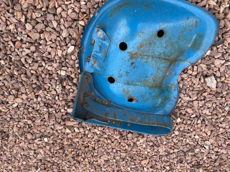 Fordson dexta seat and sprung bracket.