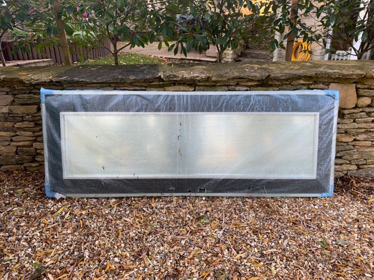 Silver and black leather framed mirror