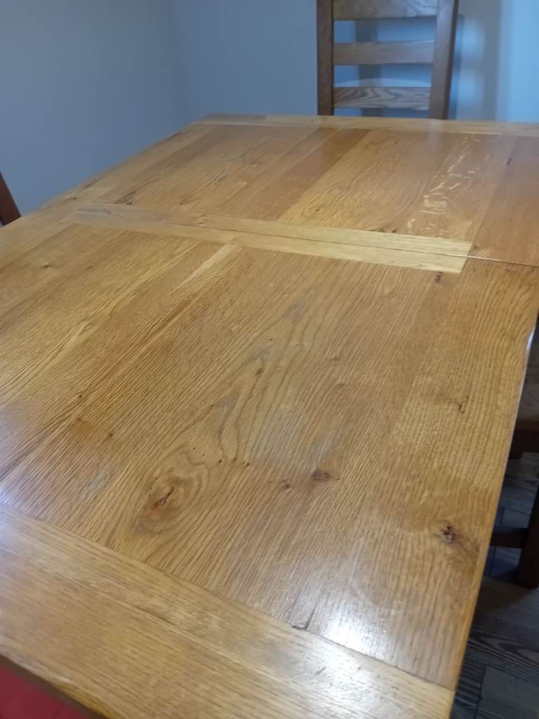 Solid medium oak table & 4 chairs