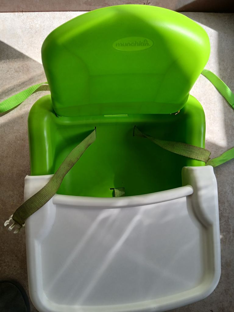 Munchkin baby/toddler booster seat with reigns