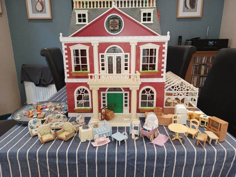 Sylvanian family Regency  hotel with figures and accessories.