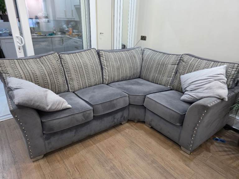 Comfy Grey Corner Sofa with Striped Back Cushions 230x180cm
