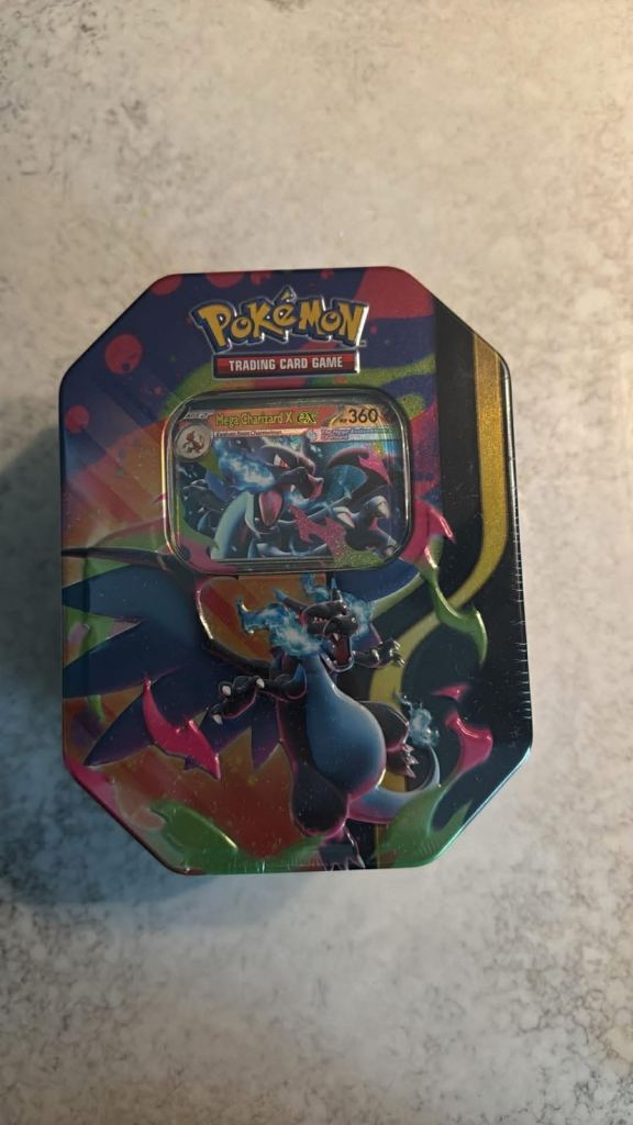 Pokémon TCG: Mega Charizard Tin - Mega Charizard X ex (4 boosters & 1 foil promo card)