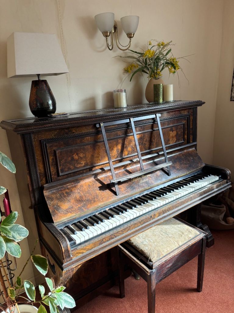 Justin Brown of London metal frame upright piano.