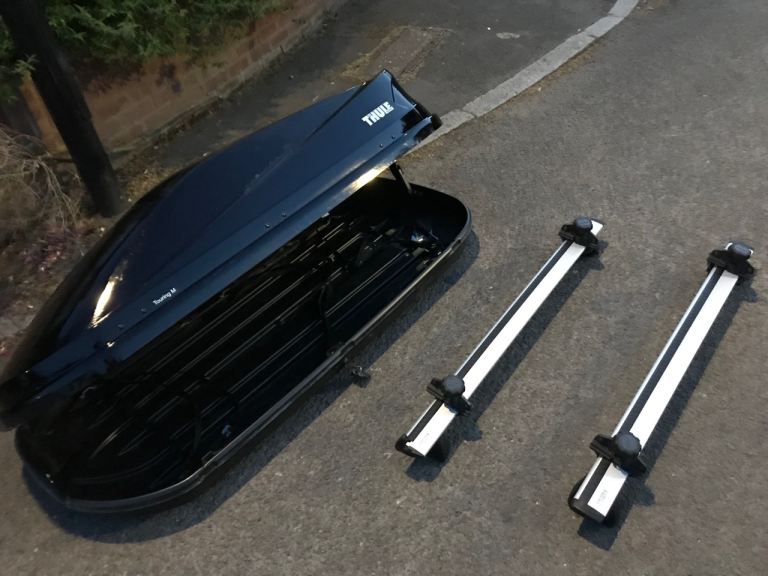 Thule roof box with wing bar 