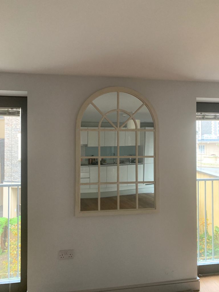 White arch mirror 