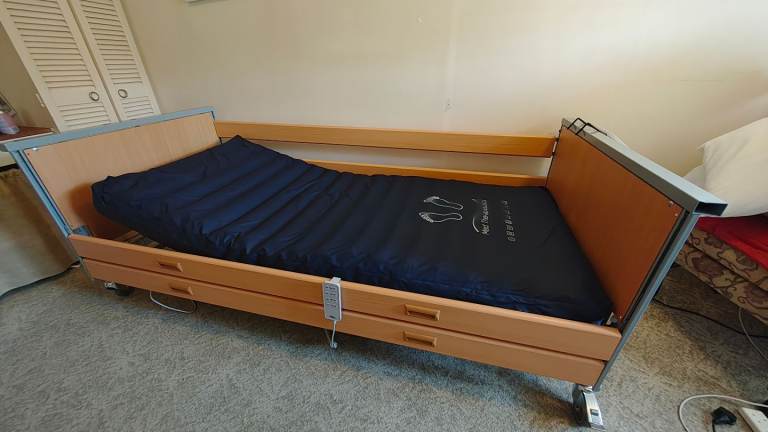 Ivacare melody hospital bed