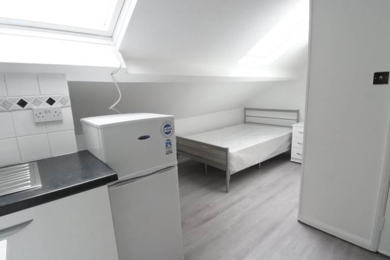 Loft studio flat on Harlesden High Street. 2 mins walk to Willesden Junction Station.
