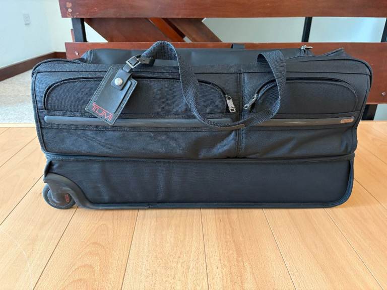 TUMI Black Wheeled Duffle Bag – Good Condition 