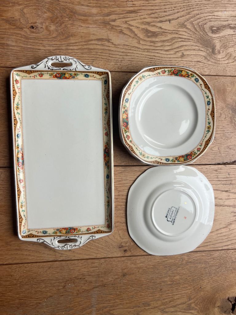 WH Grindley & Co Ivory.  Lovely set comprising of 6 Side plates and sandwich rectangle plate.