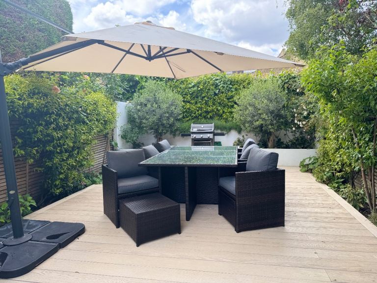 Outdoor Rattan Dining Table including 6 Chairs and foot stools