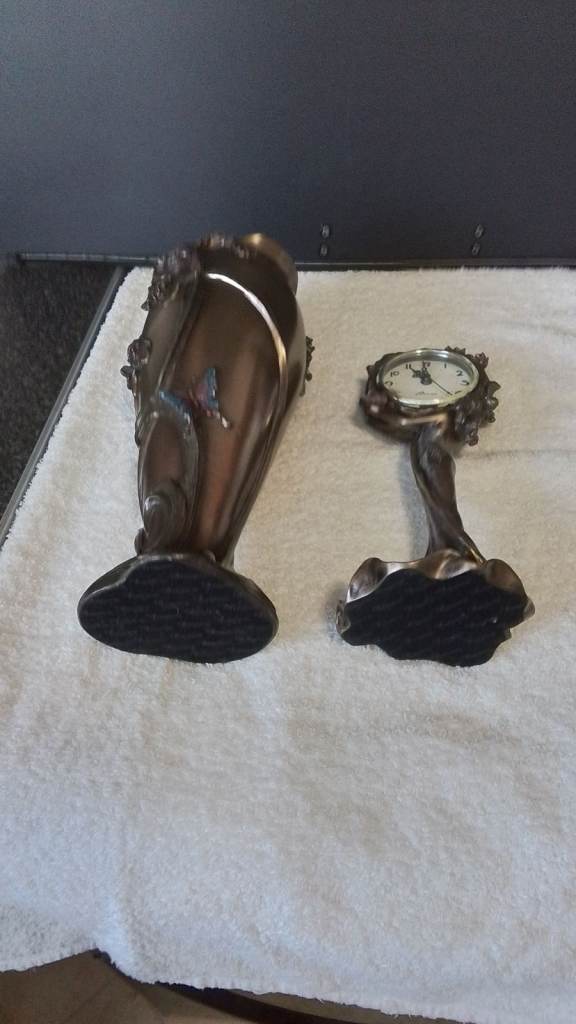 Art nouveau clock and vase