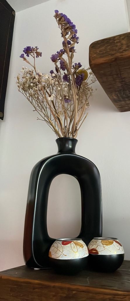 Modern Black Ceramic Vase with Dried Flowers and matching candle holders