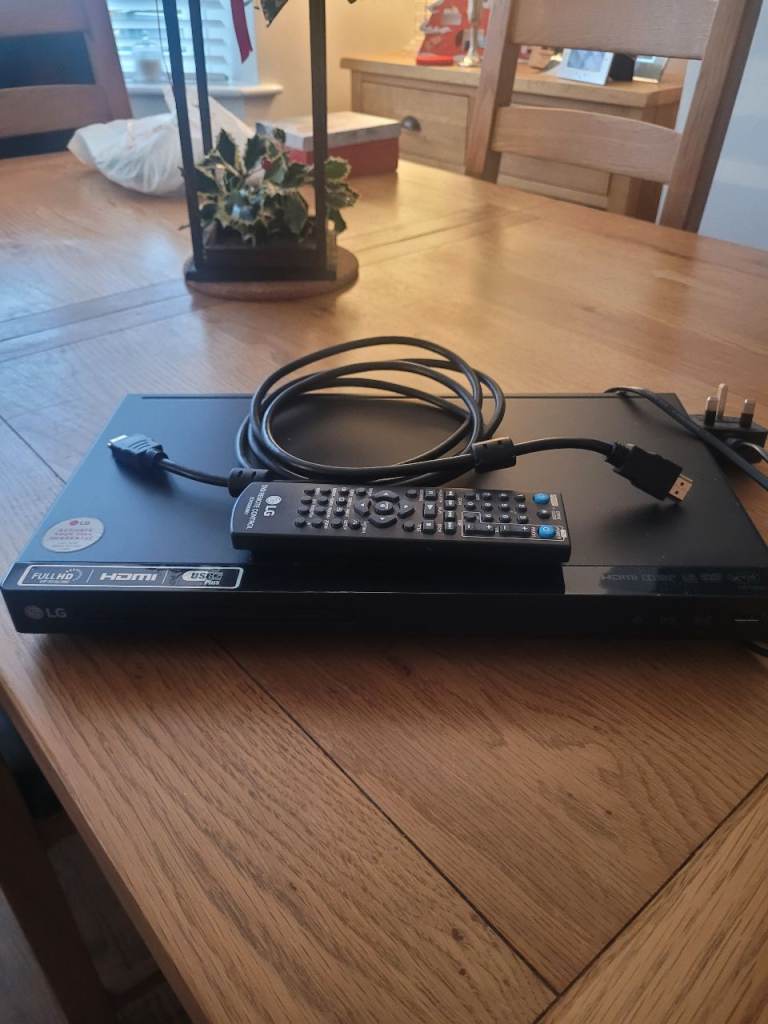 LG CD player, with hdmi lead and remote