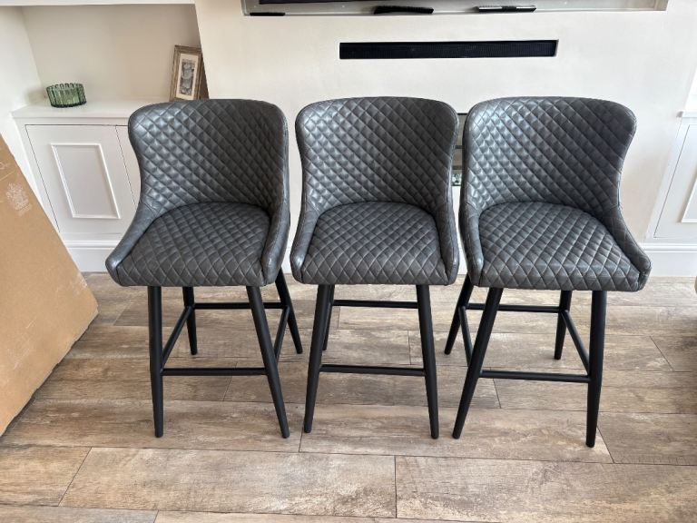 3 Grey bar stools 