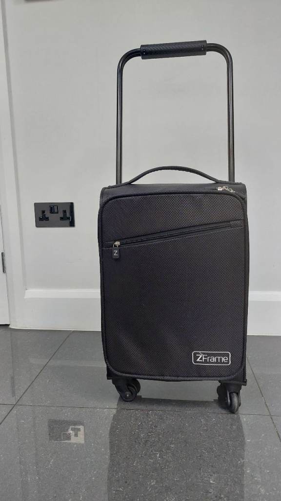 Free Black in-flight hand carry bag in good ,clean condition .for size check pics .