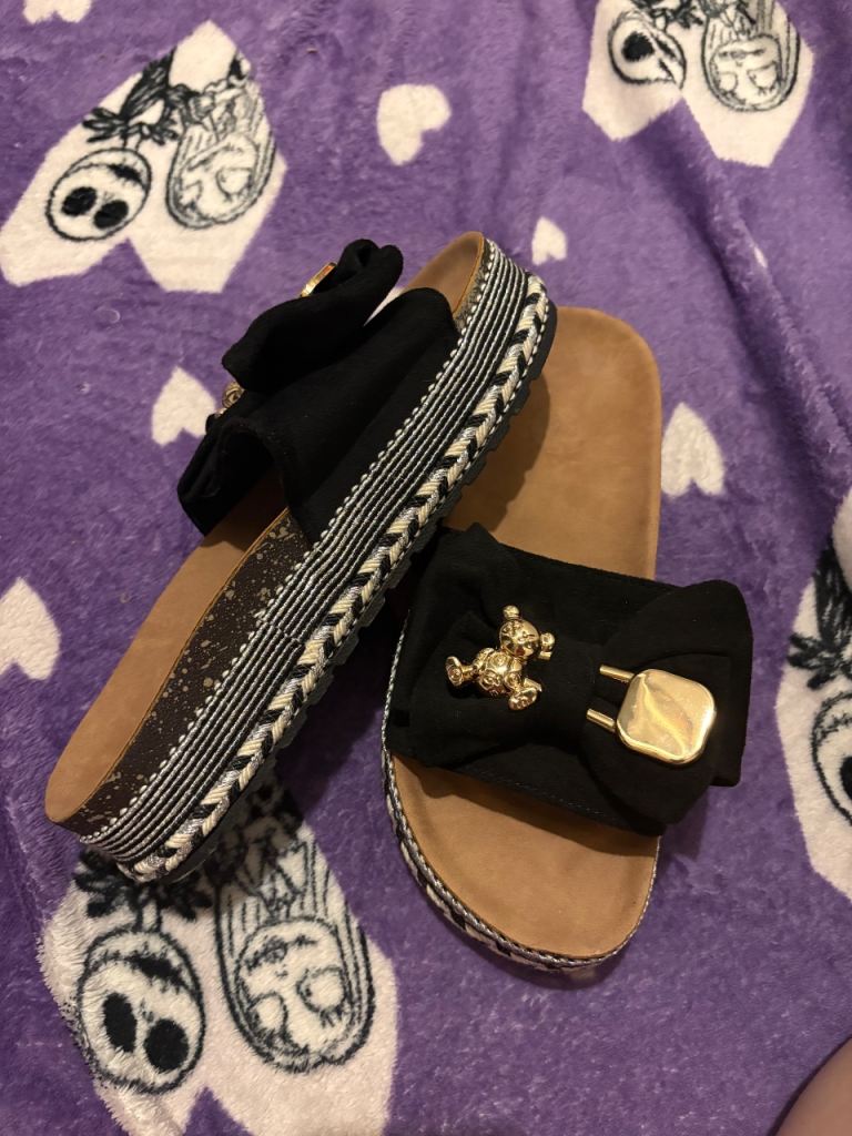 Stylish Black Platform Sliders with gold bear detailing