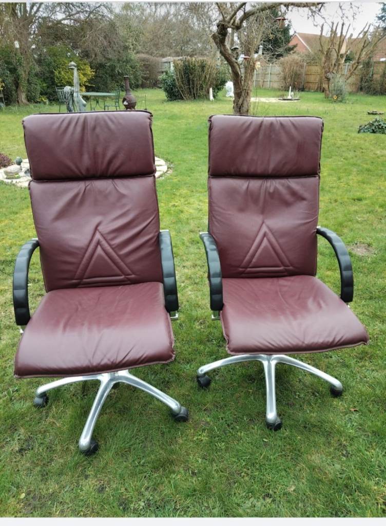 Leather chairs swivel and recline