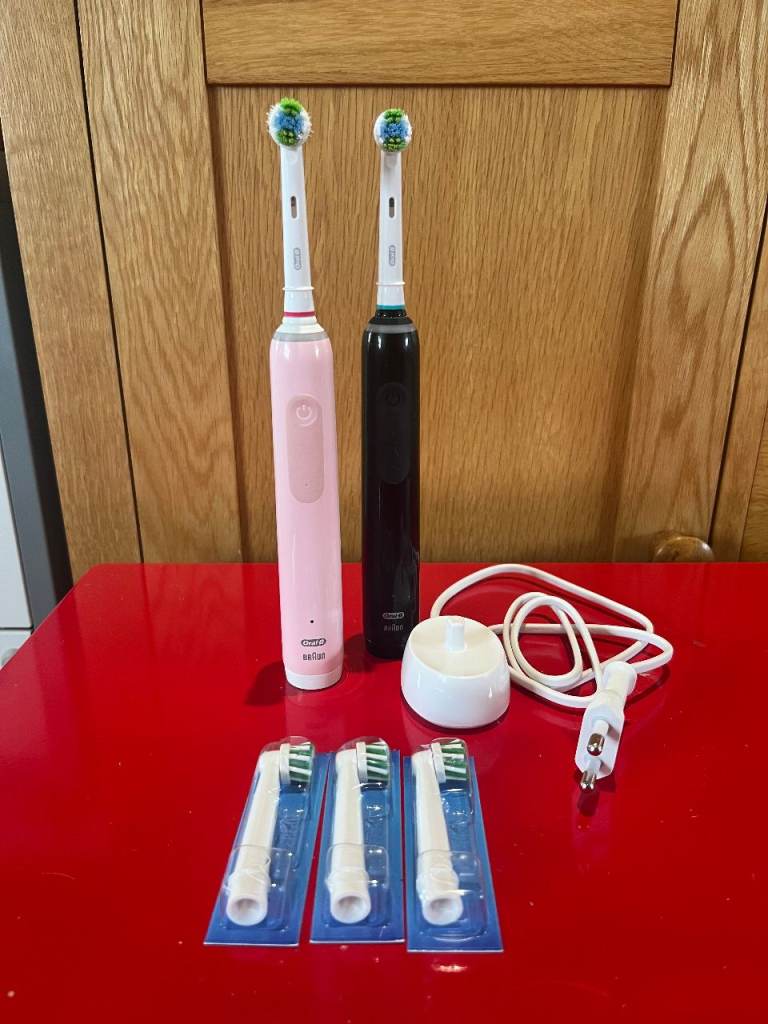 2x Oral B Electric Toothbrushes & New Brushheads - Pink & Black Duo Couple