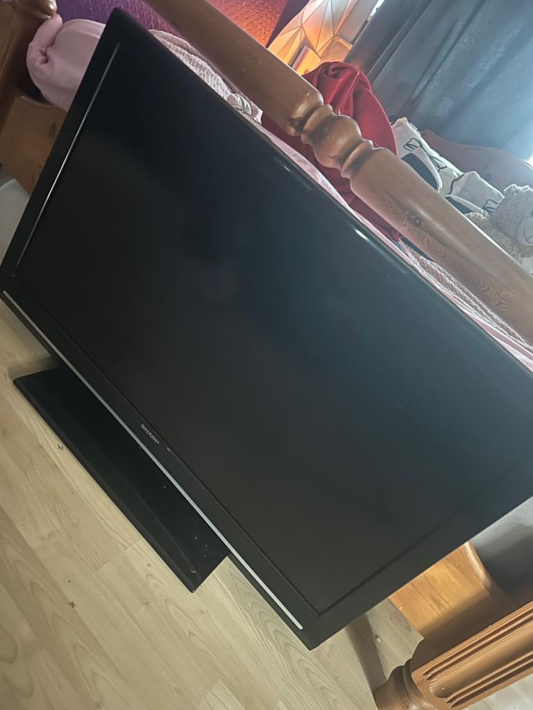 Sharp 43’ TV with Remote and Stand – Good Condition