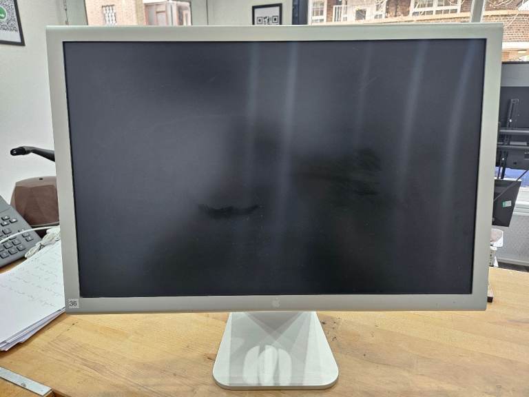The Apple Cinema Display 23-inch Aluminum, A1082 with 90w power supply