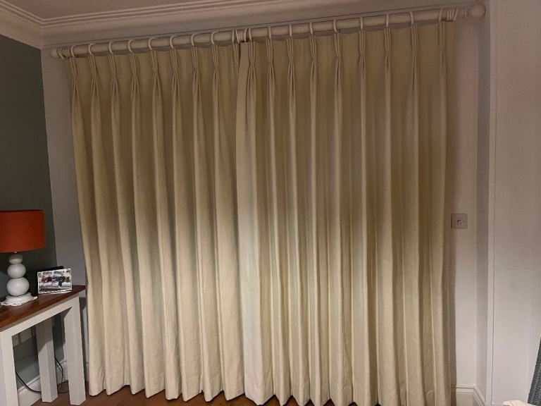 2 pairs neutral coloured curtains