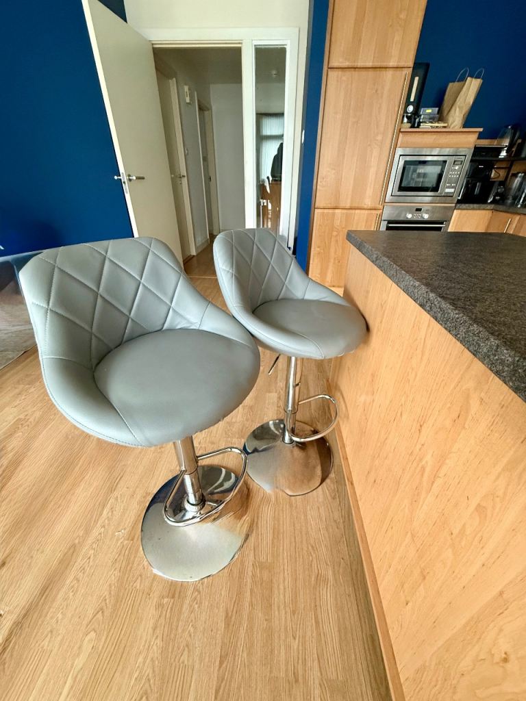 Pair of Grey Faux Leather Bar Stools with Chrome Base