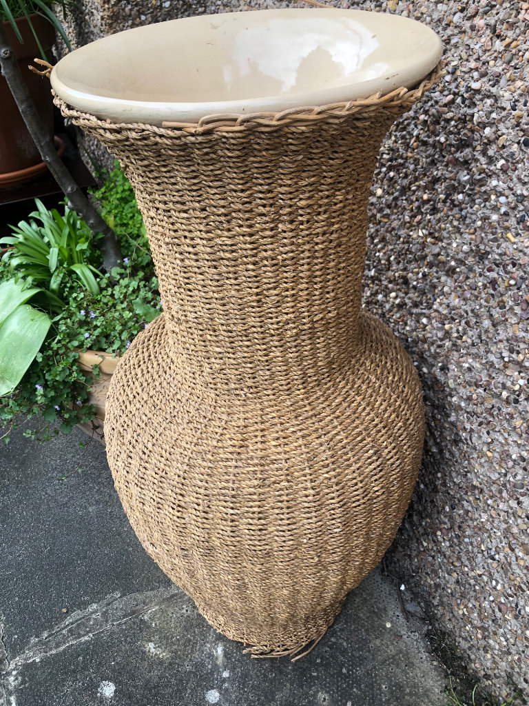 Antique very large ceramic, rattan clad urn / vase.