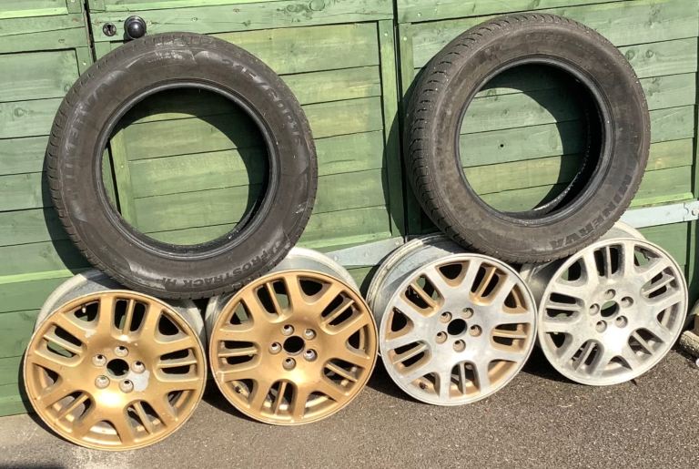 SUBARU OUTBACK WHEELS AND TWO TYRES