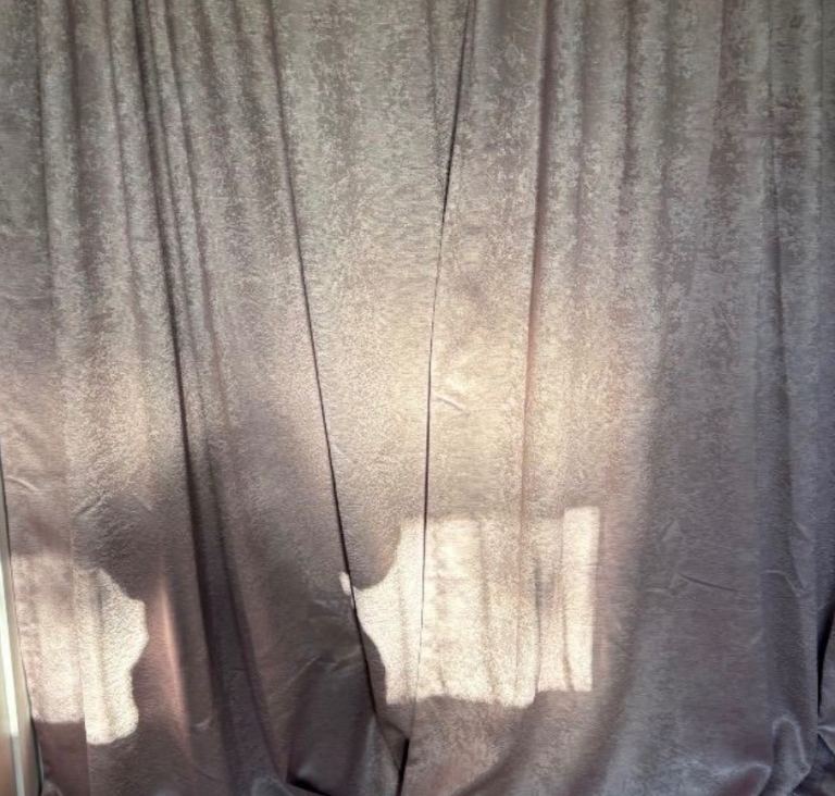 Floor to ceiling pink pencil pleat curtains