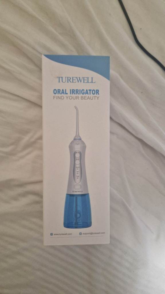 Brand new water flosser (TUREWELL FC1592 Cordless Water Flosser - White)