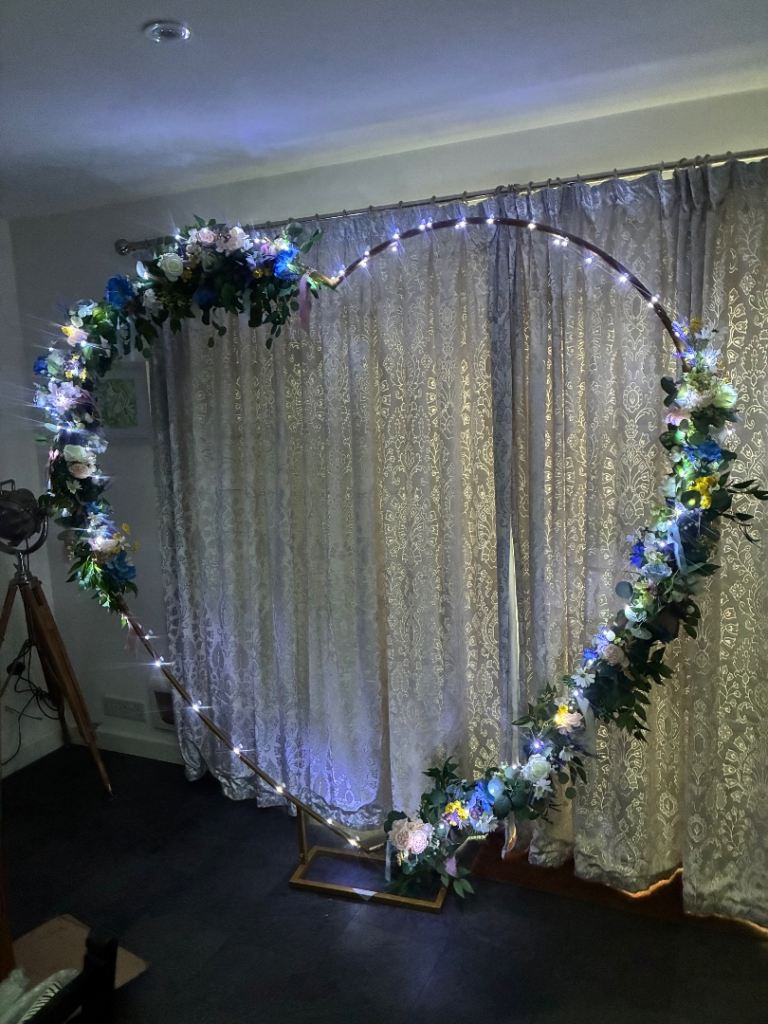 Heart-Shaped Wedding Arch with Floral Decoration and Lights